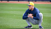 Milwaukee Brewers pitcher Vinny Nittoli stretches during spring training workouts Monday, February 17, 2025, at American Family Fields of Phoenix in Phoenix, Arizona.