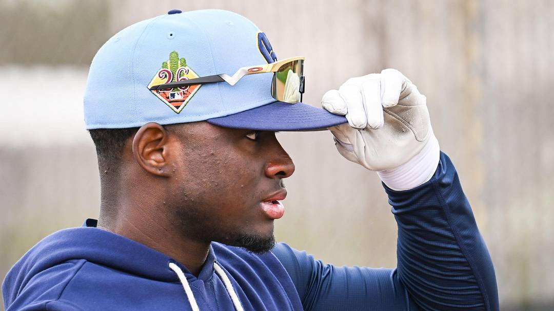 Milwaukee Brewers outfielder Luis Lara adjusts his cap during spring training workouts Monday, February 16, 2026, at American Family Fields of Phoenix in Phoenix, Arizona.