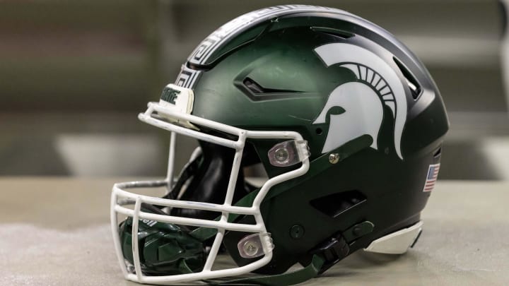 Nov 24, 2023; Detroit, Michigan, USA; A Michigan State Spartans helmet sits on a bench during the second half game against the Penn State Nittany Lions at Ford Field. Mandatory Credit: David Reginek-USA TODAY Sports