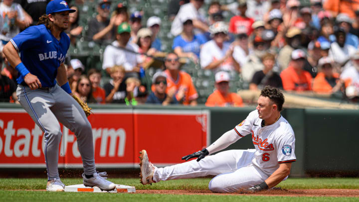 Jul 31, 2024; Baltimore, Maryland, USA; Baltimore Orioles first baseman Ryan Mountcastle (6) slides into third base with a triple against the Toronto Blue Jays during the first inning at Oriole Park at Camden Yards. 