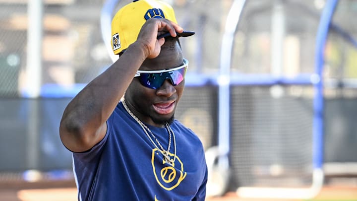 Milwaukee Brewers outfielder Luis Lara walks to the field during spring training workouts Tuesday, February 18, 2025, at American Family Fields of Phoenix in Phoenix, Arizona.