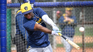 Milwaukee Brewers outfielder Luis Lara takes batting practice during spring training.
