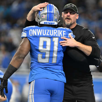 Jan 21, 2024; Detroit, Michigan, USA; Detroit Lions head coach Dan Campbell with defensive end Levi Onwuzurike (91) before a 2024 NFC divisional round game against the Tampa Bay Buccaneers at Ford Field. Mandatory Credit: Lon Horwedel-USA TODAY Sports