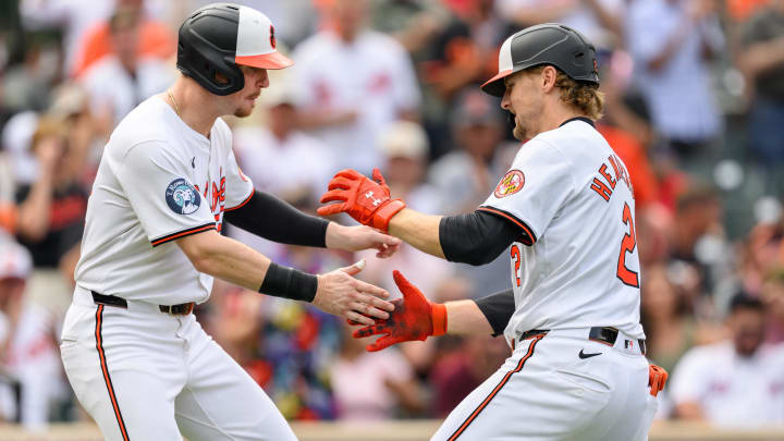 Aug 18, 2024; Baltimore, Maryland, USA; Baltimore Orioles shortstop Gunnar Henderson (2) celebrates with first baseman Ryan O'Hearn (32) after hitting a home run during the sixth inning against the Boston Red Sox at Oriole Park at Camden Yards. Mandatory Credit: Reggie Hildred-USA TODAY Sports