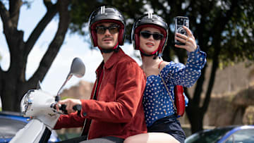 Emily in Paris. (L to R) Eugenio Franceschini as Marcello, Lily Collins as Emily in episode 409 of Emily in Paris. Cr. Giulia Parmigiani/Netflix © 2024