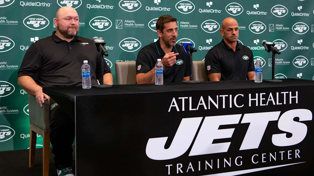 Apr 26, 2023; Florham Park, NJ, USA; New York Jets general manager Joe Douglas (left) quarterback Aaron Rodgers (center) and head coach Robert Saleh (right) talk to the media during the introductory press conference at Atlantic Health Jets Training Center. 