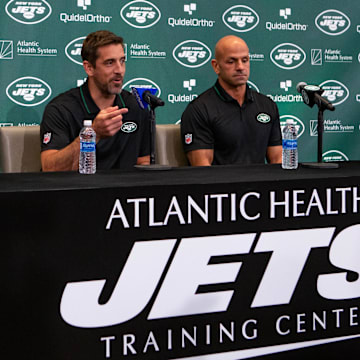 Apr 26, 2023; Florham Park, NJ, USA; New York Jets general manager Joe Douglas (left) quarterback Aaron Rodgers (center) and head coach Robert Saleh (right) talk to the media during the introductory press conference at Atlantic Health Jets Training Center. 