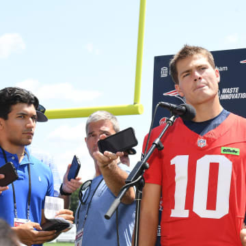 Jul 26, 2024; Foxborough, MA, USA; New England Patriots quarterback Drake Maye (10) holds a press conference at training camp at Gillette Stadium. Mandatory Credit: Eric Canha-USA TODAY Sports