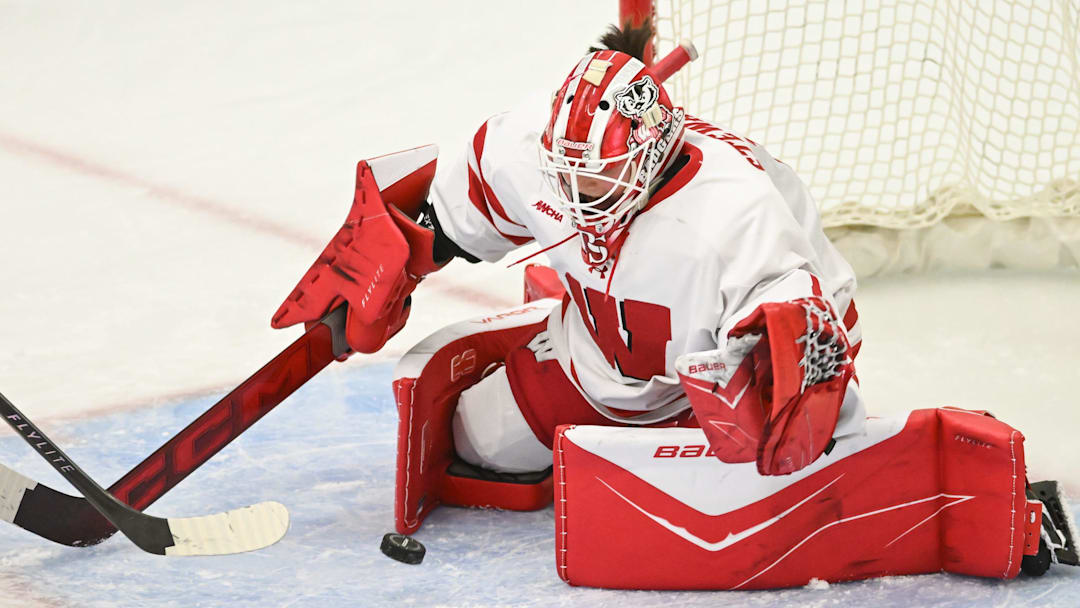 Wisconsin goaltender Rhyah Stewart (1) covers the puck in a game against Ohio State Sunday, February 8, 2026, at LaBahn Arena in Madison, Wisconsin.