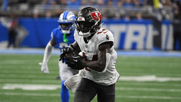 Tampa Bay Buccaneers wide receiver Chris Godwin (14) scores a touchdown against the Detroit Lions in the second quarter