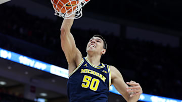Feb 16, 2025; Columbus, Ohio, USA;  Michigan Wolverines center Vladislav Goldin (50) dunks the ball during the first half against the Ohio State Buckeyes at Value City Arena. Mandatory Credit: Joseph Maiorana-Imagn Images