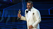 Jordan Peele accepts the Oscar for Original Screenplay for \"Get Out\" during the 90th Academy Awards.