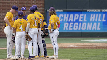 Jun 3, 2024; Chapel Hill, NC, USA;  The Louisiana State Tigers huddle on the mound during the second inning of the Div. I NCAA baseball regional against the North Carolina Tar Heels at Boshamer Stadium.  Mandatory Credit: Jeffrey Camarati-Imagn Images
