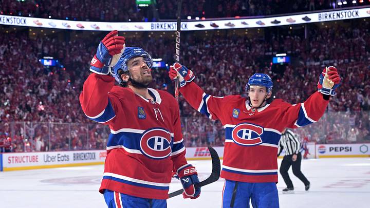 May 10, 2026; Montreal, Quebec, CAN; Montreal Canadiens forward Alex Newhook (15) celebrates with teammate defenseman Lane Hutson (48) after scoring a goal against the Buffalo Sabresduring the first period in game three of the second round of the 2026 Stanley Cup Playoffs at the Bell Centre. Mandatory Credit: Eric Bolte-Imagn Images
