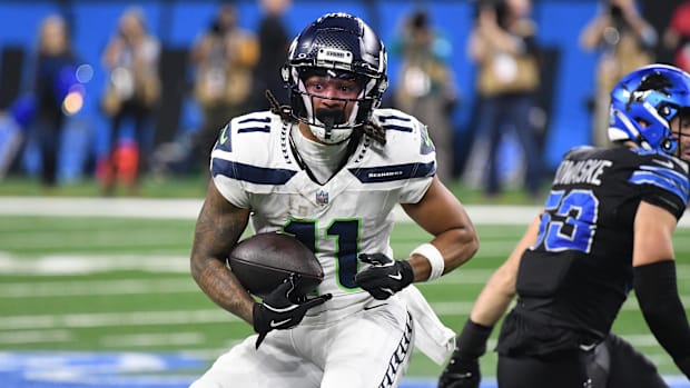 Seattle Seahawks wide receiver Jaxon Smith-Njigba runs the ball against the Detroit Lions.