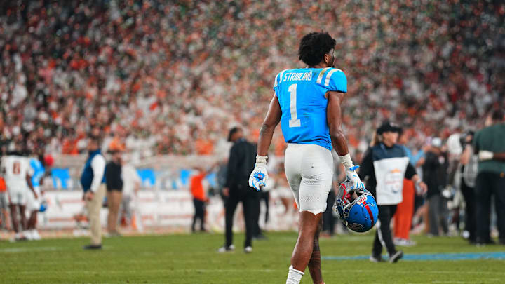 Jan 8, 2026; Glendale, AZ, USA; Mississippi Rebels wide receiver De'zhaun Stribling (1) reacts after the game against the Miami Hurricanes during the 2026 Fiesta Bowl and semifinal game of the College Football Playoff at State Farm Stadium. Mandatory Credit: Joe Camporeale-Imagn Images