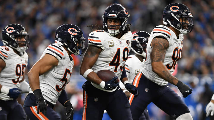 Tremaine Edmunds isn't giving up the ball after an interception as the Bears defense celebrates a turnover against Detroit.