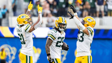 Green Bay Packers cornerback Eric Stokes (L), safeties...