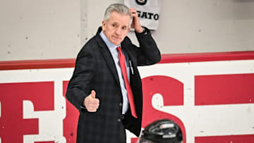 Wisconsin Badgers head coach Mark Johnson acknowledges an official after an 11-0 victory against the Bemidji State Beavers in a WCHA first-round game Saturday, March 1, 2025, at LaBahn Arena in Madison, Wisconsin.