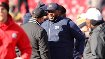 Nov 30, 2024; Columbus, Ohio, USA;  Ohio State Buckeyes head coach Ryan Day (left) greets Michigan Wolverines head coach Sherrone Moore before the game at Ohio Stadium.