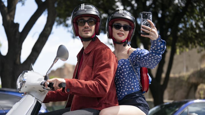 Emily in Paris. (L to R) Eugenio Franceschini as Marcello, Lily Collins as Emily in episode 409 of Emily in Paris. Cr. Giulia Parmigiani/Netflix © 2024