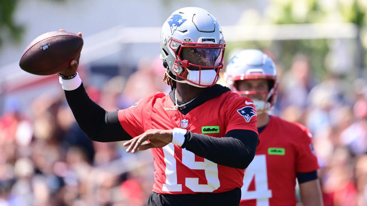 Jul 26, 2024; Foxborough, MA, USA; New England Patriots quarterback Joe Milton III (19) throws a pass during training camp at Gillette Stadium. Mandatory Credit: Eric Canha-USA TODAY Sports