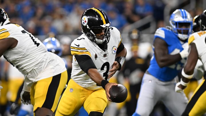 Aug 24, 2024; Detroit, Michigan, USA;  Pittsburgh Steelers quarterback Russell Wilson (3) hands the ball off against the Detroit Lions in the first quarter at Ford Field. Mandatory Credit: Lon Horwedel-USA TODAY Sports