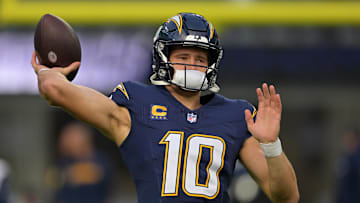 Nov 30, 2025; Inglewood, California, USA; Los Angeles Chargers quarterback Justin Herbert (10) practices before the game at SoFi Stadium. 