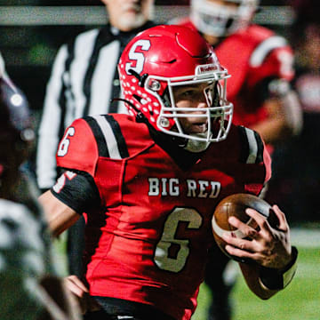 Steubenville's Aiden Davis on a touchdown run against Dover during a Division III, Region 11 semifinal game, Friday, Nov. 15, at Carrollton High School’s Warrior Stadium, in Carrollton.