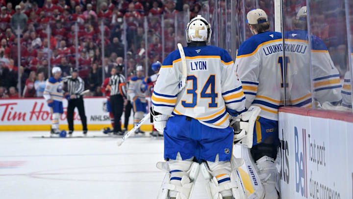 May 10, 2026; Montreal, Quebec, CAN; Buffalo Sabres goalie Alex Lyon (34) and teammate goalie Ukko-Pekka Luukkonen (1) watch the post period shoving during the first period in game three of the second round of the 2026 Stanley Cup Playoffs at the Bell Centre. Mandatory Credit: Eric Bolte-Imagn Images