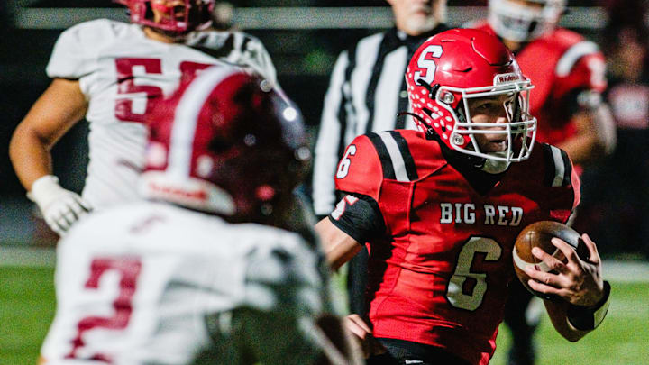 Steubenville's Aiden Davis on a touchdown run against Dover during a Division III, Region 11 semifinal game, Friday, Nov. 15, at Carrollton High School’s Warrior Stadium, in Carrollton.