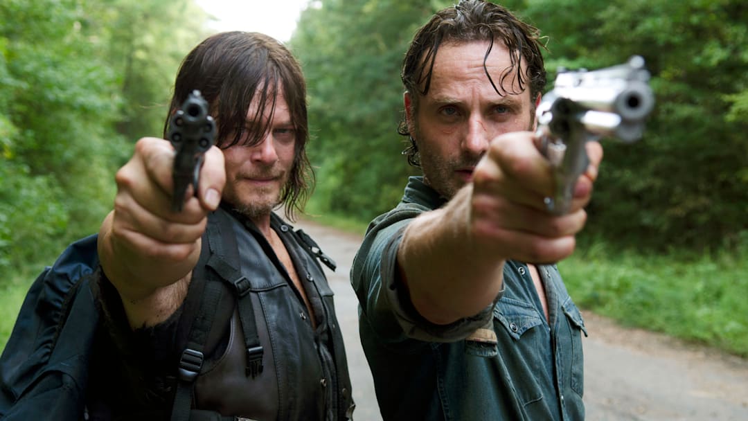 Andrew Lincoln as Rick Grimes and Norman Reedus as Daryl Dixon in The Walking Dead season 6