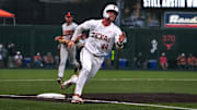 Texas Longhorns outfielder Max Belyeu (44) rounds third base after a hit team mate's hit during the game against Oklahoma State at UFCU Disch–Falk Field on Friday, May. 3, 2024 in Austin.