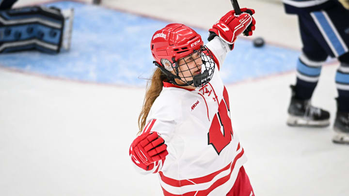 Wisconsin center Cassie Hall (11) celebrates her goal in the second period of a game Friday, October 3, 2025, at LaBahn Arena in Madison, Wisconsin.