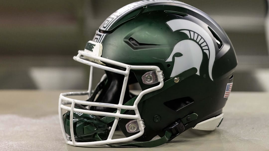 Nov 24, 2023; Detroit, Michigan, USA; A Michigan State Spartans helmet sits on a bench during the second half game against the Penn State Nittany Lions at Ford Field.