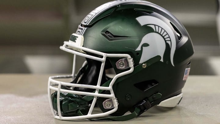 Nov 24, 2023; Detroit, Michigan, USA; A Michigan State Spartans helmet sits on a bench during the second half game against the Penn State Nittany Lions at Ford Field.