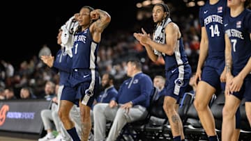 Penn State Nittany Lions guard Ace Baldwin Jr. (1) and teammates celebrate on the bench during the second half against the Virginia Tech Hokies at CFG Bank Arena. 