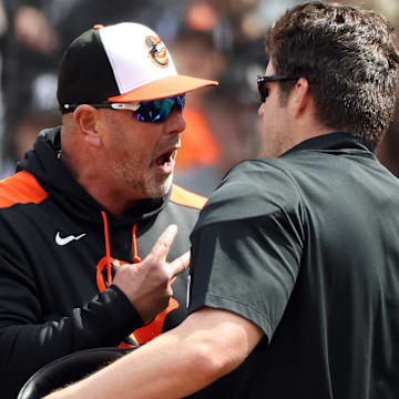 Apr 13, 2025; Baltimore, Maryland, USA; Orioles manager Brandon Hyde gets ejected by home plate umpire John Bacon during the third inning against the Toronto Blue Jays at Oriole Park at Camden Yards.