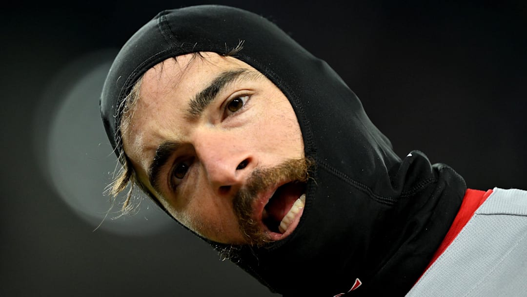 Apr 5, 2026; Detroit, Michigan, USA;  St. Louis Cardinals shortstop Thomas Saggese (25) waits for a teammate to bring him his hat and glove after making the third out against the Detroit Tigers in the sixth inning at Comerica Park. Mandatory Credit: Lon Horwedel-Imagn Images