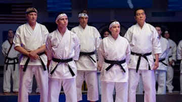 Cobra Kai. (L to R) William Zabka as Johnny Lawrence, Tanner Buchanan as Robby Keene, Ralph Macchio as Daniel LaRusso, Mary Mouser as Samantha LaRusso, Yuji Okumoto as Chozen in Cobra Kai. Cr. Curtis Bonds Baker/Netflix © 2024