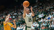 Colorado State's Ethan Morton puts up a 2-pointer during a gam against Wyoming 