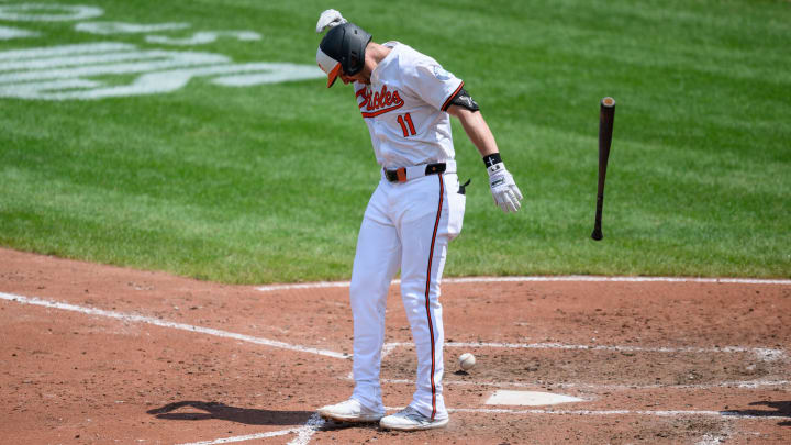 Jul 31, 2024; Baltimore, Maryland, USA; Baltimore Orioles third baseman Jordan Westburg (11) is hit by a pitch during the fifth inning against the Toronto Blue Jays at Oriole Park at Camden Yards. 