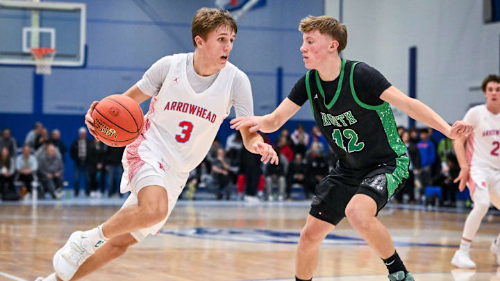 Arrowhead guard Trey Resch (3) drives against Oshkosh North guard Jackson Anderson in a game in the Rick Majerus WBY Shootout on Friday, December 27, 2024, at Concordia University in Mequon, Wisconsin. Arrowhead guard Trey Resch (3) drives against Oshkosh North guard Jackson Anderson in a game in the Rick Majerus WBY Shootout on Friday, December 27, 2024, at Concordia University in Mequon, Wisconsin.