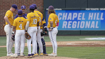 Jun 3, 2024; Chapel Hill, NC, USA;  The Louisiana State Tigers huddle on the mound during the second inning of the Div. I NCAA baseball regional against the North Carolina Tar Heels at Boshamer Stadium.  Mandatory Credit: Jeffrey Camarati-Imagn Images
