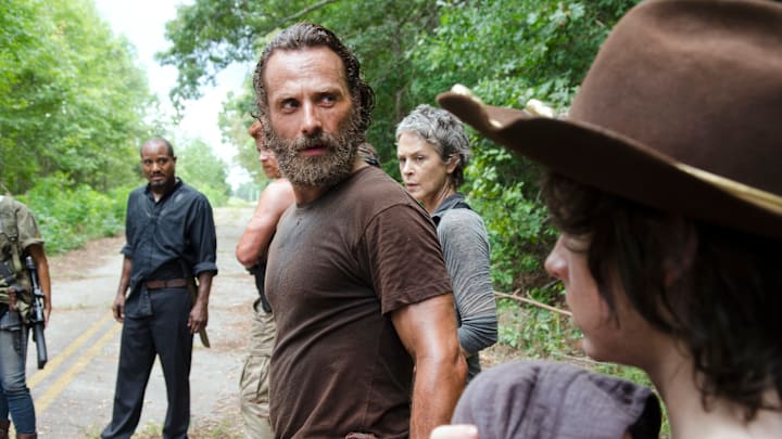 Seth Gilliam as Father Gabriel, Andrew Lincoln as Rick Grimes, Melissa McBride as Carol Peletier, and Chandler Riggs as Carl Grimes - The Walking Dead season 5