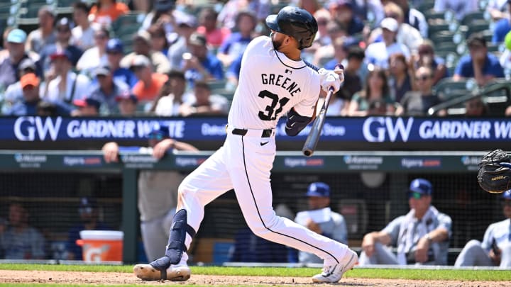 Jul 13, 2024; Detroit, Michigan, USA; Detroit Tigers center fielder Riley Greene (31) hits a double against the Los Angeles Dodgers in the seventh inning at Comerica Park.