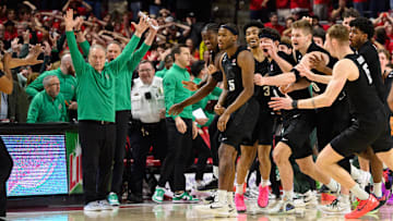 Feb 26, 2025; College Park, Maryland, USA; Michigan State Spartans celebrate after a shot by Michigan State Spartans guard Tre Holloman (5) goes in at the buzzer against the Maryland Terrapins during the second half at Xfinity Center. Mandatory Credit: Reggie Hildred-Imagn Images