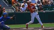 Texas Longhorns infielder Jalin Flores (1) swings at a ball during the game against Kansas at UFCU Disch–Falk Field on Saturday, May. 18, 2024 in Austin.