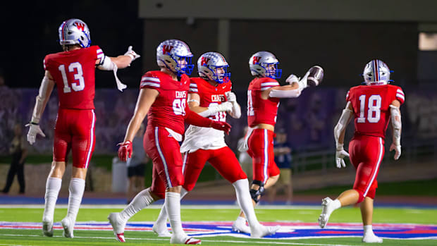 Westlake Chaparrals middle linebacker Elliott Schaper (31) holds the turnover fumble recovery against Atascosita in a loss.
