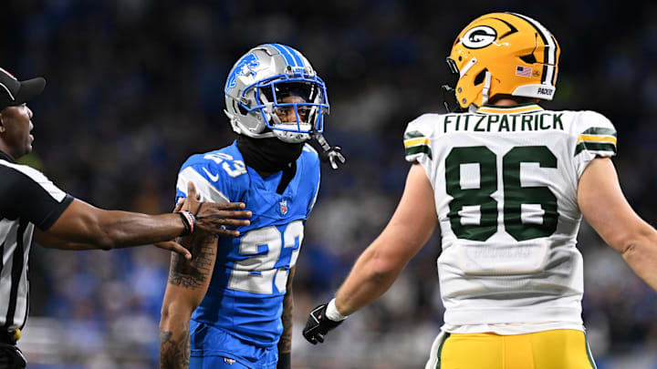 Dec 5, 2024; Detroit, Michigan, USA; Detroit Lions cornerback Carlton Davis III (23) and Green Bay Packers tight end John FitzPatrick (86) exchange words in the second quarter at Ford Field. Mandatory Credit: Lon Horwedel-Imagn Images Dec 5, 2024; Detroit, Michigan, USA; Detroit Lions cornerback Carlton Davis III (23) and Green Bay Packers tight end John FitzPatrick (86) exchange words in the second quarter at Ford Field. Mandatory Credit: Lon Horwedel-Imagn Images